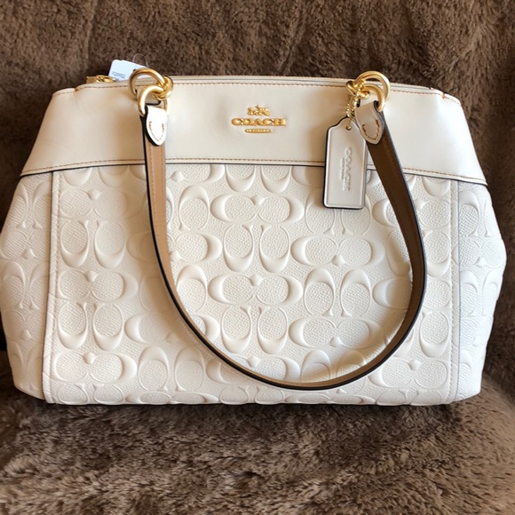 Coach Handbags - NWT Coach sig leather carryall crossbody